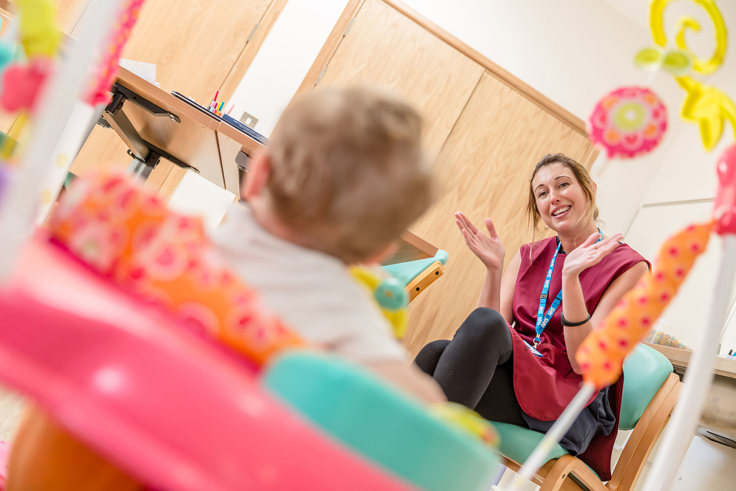 MBU staff member with child MBU staff member with child