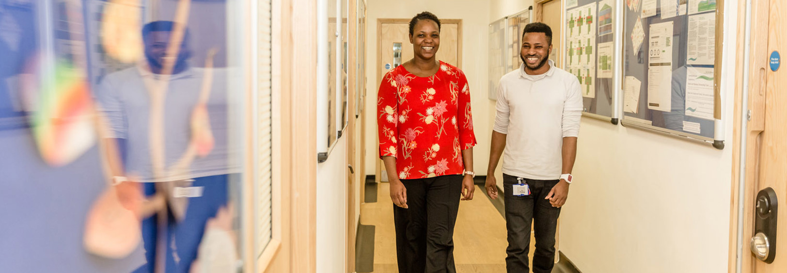 Boughton staff walking down corridor
