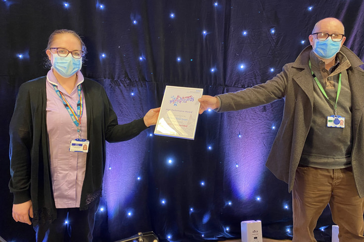 Members of the patient Flow team with award Members of the patient Flow team with award