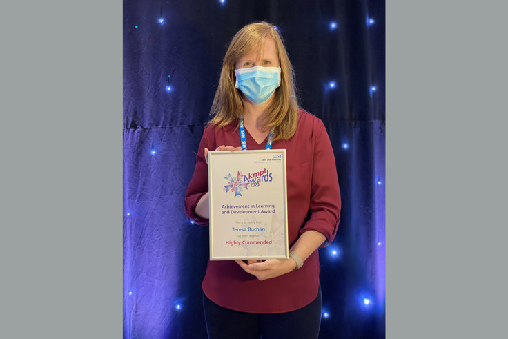 Teresa Buchan with certificate Teresa Buchan with certificate