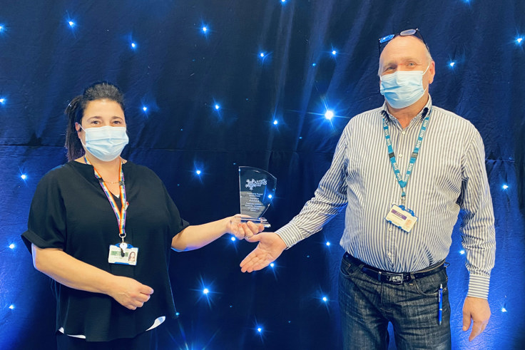 Members of the Estates and portering team with award Members of the Estates and portering team with award