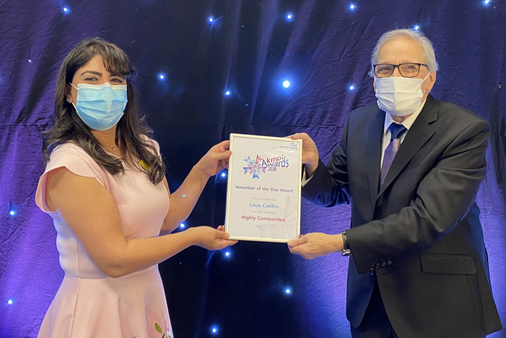 Louis Coelle and Afifa Qazi. Louis holds his certificate Louis Coelle and Afifa Qazi. Louis holds his certificate