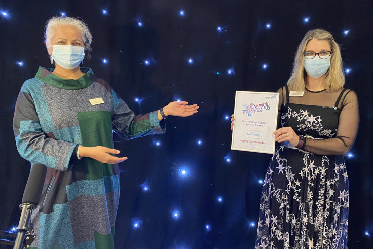 Jacquie and Venu with award Jacquie and Venu with award