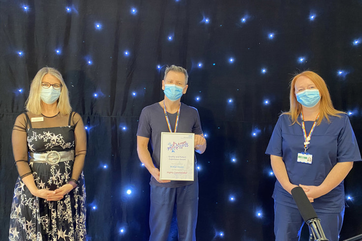 Bridge House team members with award Bridge House team members with award