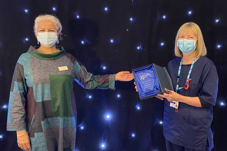 Kim Terry and Venu Branch with award Kim Terry and Venu Branch with award