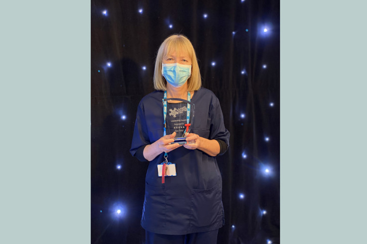 Kim Terry with award Kim Terry with award