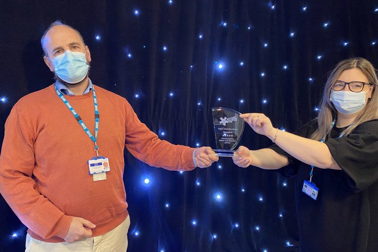 Peter Griffin and Rebecca Elkington with award Peter Griffin and Rebecca Elkington with award