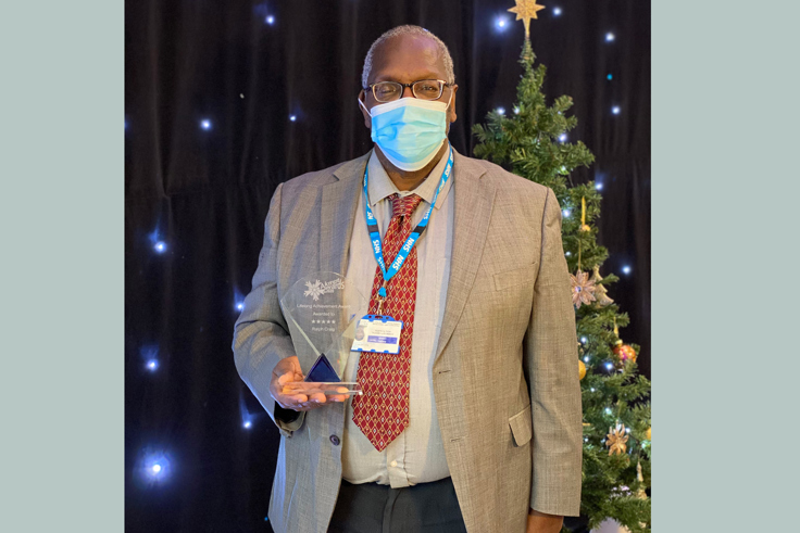 Ralph Craig with award Ralph Craig with award
