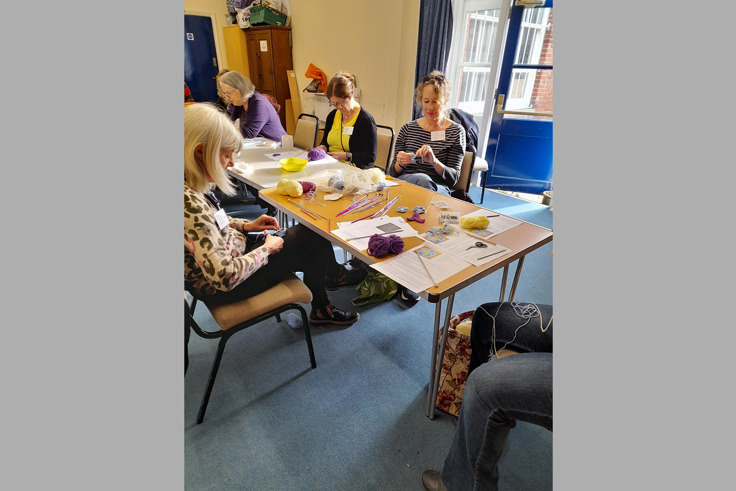 Members of the Forget me Nots doing crafts Members of the Forget me Nots doing crafts