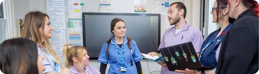 a room with various kmmh staff nurses